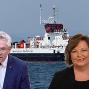 Senior SNP MSP Kenneth Gibson with transport secretary Fiona Hyslop and one of the ferries that are due to be replaced