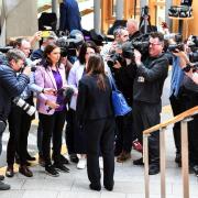 Kate Forbes MSP of the Scottish National Party (SNP) speaks to journalists at the Scottish Parliament