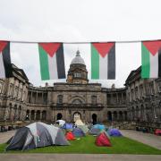 Students at an encampment at the Old College at the University of Edinburgh, protesting against the war in Gaza