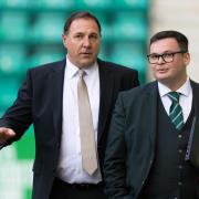 Malky Mackay, left, arriving at Easter Road for his first game after being named as sporting director.