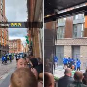 Rangers supporters walk past the renowned Celtic bar