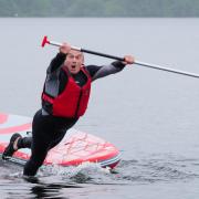 Liberal Democrat leader Sir Ed Davey takes a fall during his Lake Windermere photo-op on Tuesday