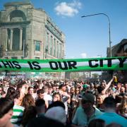 Celtic fans celebrating the Parkhead club's cinch Premiership victory in the Trongate earlier this month