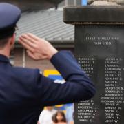 A man salutes during Anzac Day commemorations in Nelson Bay, New Zealand (Mark Baker/AP)