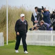 US President Donald Trump attends the opening of the Trump International Golf Links, the