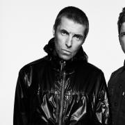 Two Mancunian musical icons, and not a hint of a smile between them.