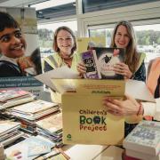 Author Gill Sims, HarperCollins UK chief executive Kate Elton and Children's Book Project chief executive Liberty Venn launch a new partnership which will see 20,000 books gifted to schools in Glasgow.