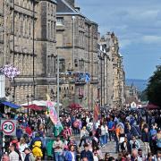 Crowds throng the Royal Mile during the Edinburgh Festival Fringe, on August 16, 2024 in Edinburgh