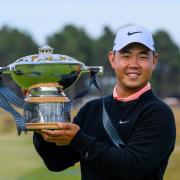 Tom Kim celebrates his Genesis Scottish Open victory