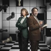 Anna Maxwell Martin as Lucy Betts-Taylor and David Mitchell as John 