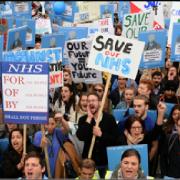 TAKING A STAND: Junior doctors protest in London and will now be balloted on industrial action as the row with Westminster over contracts intensifies.
