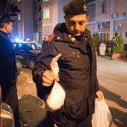 An Italian policeman holds a bag full of cocaine which was found in a car in the Scampia area of  Naples