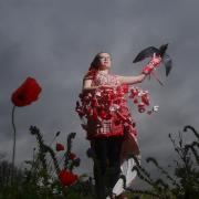 Georgi Watson wears the specially fashioned PoppyScotland dress made by Scottish-based designer Isabell Buenz   Photograph by Gordon Terris