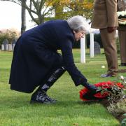 Theresa May lays wreath in Belgium (Photo: PA)
