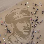 A sand drawing on Ayr Beach of Second Lieutenant Walter Tull, who was BritainÕs second black professional footballer who had signed up with Rangers, and the first black officer in the British Army. Pages of the Sea: Danny BoyleÕs Armistice
