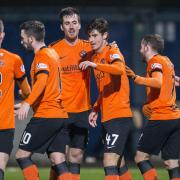 Dundee United's Ian Harkes scores the fourth goal for his side
