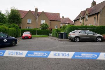 Woman dead and man arrested after Edinburgh weapon incident