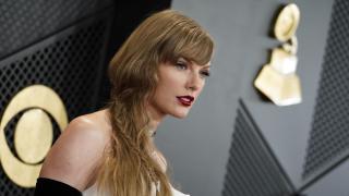 Taylor Swift arrives at the 66th annual Grammy Awards in February