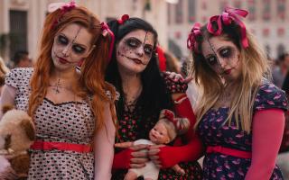 Three girls in Halloween make up. Credit: Canva