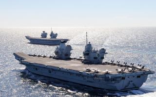 Handout photo issued by the Ministry of Defence (MoD) of HMS Queen Elizabeth and HMS Prince of Wales meeting at sea for the first time off the coast of north west Scotland following Exercise Strike Warrior 21. Picture date: Wednesday May 19, 2021. PA