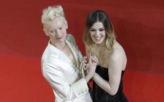 Honor Swinton Byrne with her mother Tilda Swinton on the red carpet