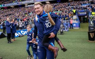 Stuart Hogg marks his 100th cap with his children at Murrayfield. He has shocked the world with his announcement he is retiring at the end of the World Cup