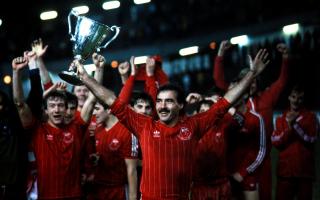 Willie Miller holds the Cup Winners' Cup aloft