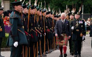 King Charles inspects the troops in Edinburgh earlier this year