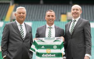 Celtic chairman Peter Lawwell, left, manager Brendan Rodgers, centre, and chief executive Michael Nicholson, right, at Parkhead last month