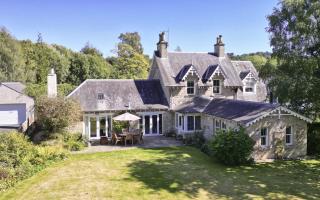 Stables Cottage is a picture perfect home with sprawling garden grounds extending to three-quarters-of-an-acre