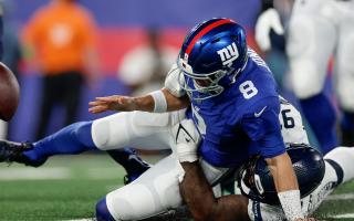 New York Giants quarterback Daniel Jones fumbles the ball as he is tackled by Seattle Seahawks defensive end Mario Edwards Jr (Adam Hunger/AP)