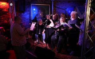 The Clutha Choir performs at the Clutha Bar