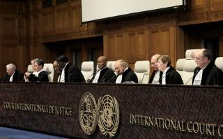 Judges preside over the opening of the hearings at the International Court of Justice in The Hague, Netherlands (Patrick Post/AP)
