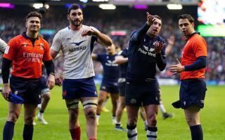 Finn Russell pleads with the officials over Scotland’s disallowed late try (Jane Barlow/PA)