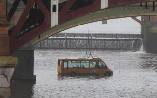 A bus was placed in the river during the drill