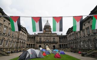 Students at an encampment at the Old College at the University of Edinburgh, protesting against the