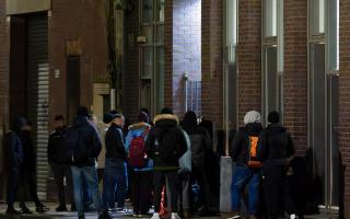 People queue outside the Overnight Welcome Centre in Glasgow