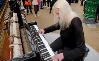 Vroni Holzmann plays Bumble Boogie at Waverley station in Channel 4's The Piano