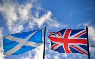 GLASGOW, SCOTLAND - MARCH 09:  A saltire flag and Union Jack flutter in the wind on March 9, 2017 in Glasgow,Scotland. Nicola Sturgeon has said in an interview that the autumn of 2018 would be a common sense date for a second Scottish Independence