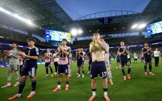 Dejected Scotland players applaud the fans after their defeat to Brazil in Miami last week