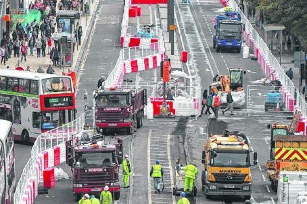 nose-to-tail: Congestion caused by the closure of Princes Street for tram repairs was felt on George Street, above, as traffic was diverted on to the thoroughfare.
