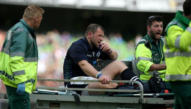 Scotland prop Ryan Grant is stretchered off with an ankle injury during the game against Dublin. Picture: PA