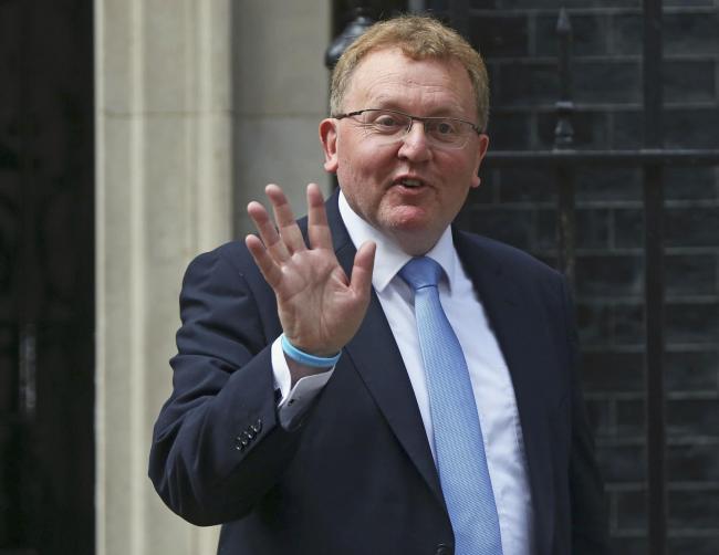 Holyrood will have power to raise taxes to reverse Tory benefit cuts, insists Mundell