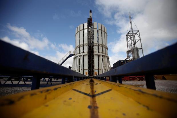 HeraldScotland: PRESTON, LANCASHIRE - OCTOBER 07:  General views of the Cuadrilla shale fracking facility on October 7, 2012 in Preston, Lancashire. The controversial method of extracting  gas by pumping high pressure water and chemicals into shale formations deep underg