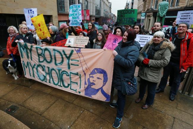 Nicola Sturgeon has said she would consider buffer zones outside abortion clinics to prevent women from suffering abuse.