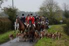 File photo dated 2/11/2013 of huntsmen and hounds of the York and Ainsty South Hunt. The Scottish National Party has said it will join forces with Labour to vote against plans to amend the law on fox hunting in England and Wales in what it called a warnin
