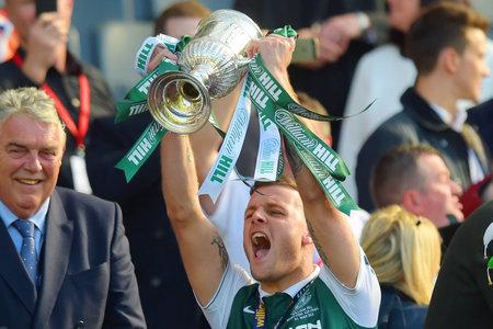 HeraldScotland: Anthony Stokes lifts the Scottish Cup after scoring twice in Hibs' 3-2 win over Rangers