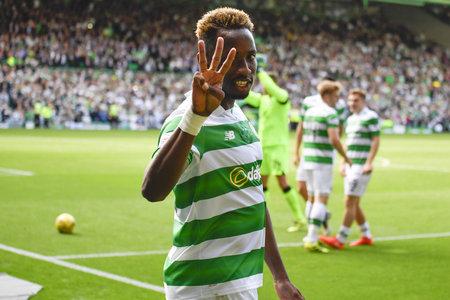 HeraldScotland: Celtic's Moussa Dembele celebrates his hat-trick