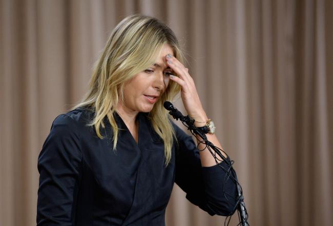 (FILE PHOTO) Maria Sharapova's drugs ban has been reduced to 15 months following her appeal to the Court of Arbitration for Sport. LOS ANGELES, CA - MARCH 07:  Tennis player Maria Sharapova addresses the media regarding a failed drug test at The LA Ho