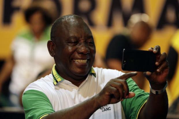 African National Congress President Cyril Ramaphosa takes a selfie after winning the vote to take over from Jacob Zuma. Picture: Themba Hadebe
